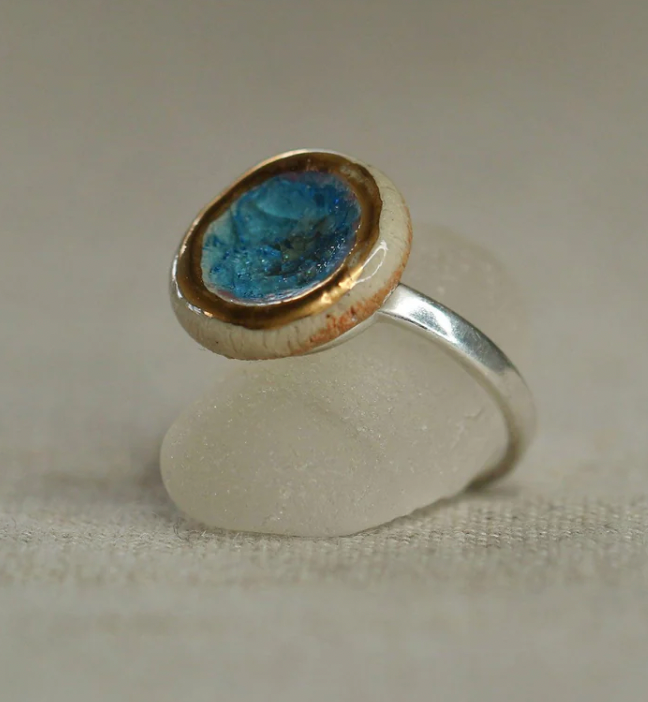 Round small adjustable blue ring