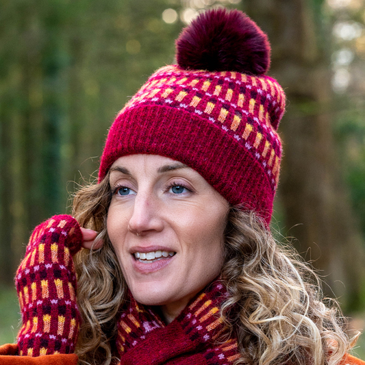 Pom red and orange intermittent stripe bobble hat